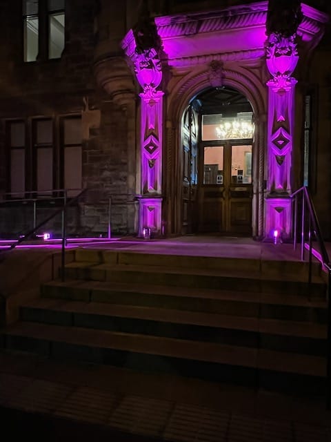 Battery uplighters illuminating St Leonards Hall for evening event